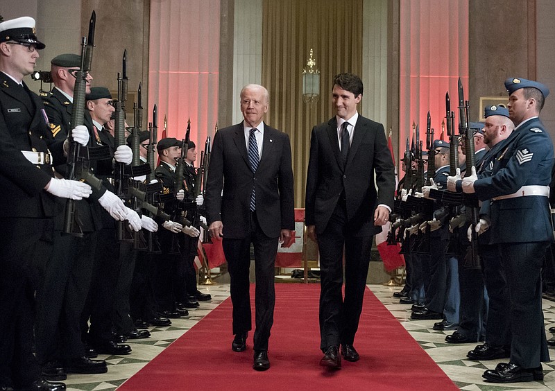 
              Prime Minister Justin Trudeau and U.S. Vice-President Joe Biden arrive at a state dinner on Thursday, Dec. 8, 2016 in Ottawa. (Justin Tang/The Canadian Press via AP)
            