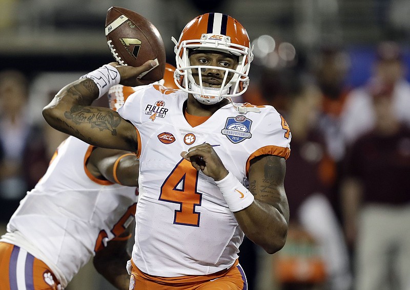 In a Saturday, Dec. 3, 2016 file photo, Clemson quarterback Deshaun Watson (4) looks to pass during the first half of the Atlantic Coast Conference championship NCAA college football gam against Virginia Tech, in Orlando, Fla. Watson acknowledges things have not been as free and easy at returning to the Heisman Trophy stage as it was getting there a year ago, when he finished third in the balloting. (AP Photo/Chris O'Meara, File)