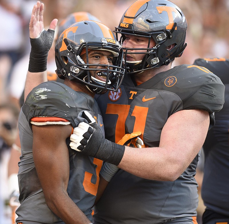 Tennessee's Josh Malone (3) is congratulated by center Dylan Wiseman (71) after a 4th quarter touchdown.  The Florida Gators visited the Tennessee Volunteers in a important SEC football contest at Neyland Stadium on September 24, 2016.