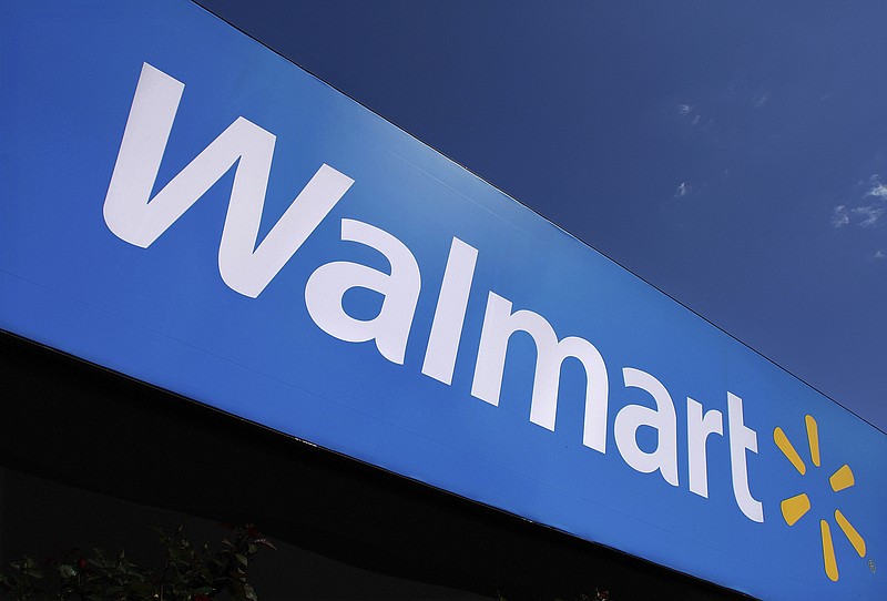 In this May 16, 2011, file photo, the Wal-Mart logo is displayed in Springfield, Ill. Wal-Mart Stores Inc. said Monday, Nov. 21, 2016, that it's kicking off its so-called "Cyber Monday" deals at 12:01 a.m. EST Friday for the first time ever as it aims to grab customers ahead of its competitors. (AP Photo/Seth Perlman, File)