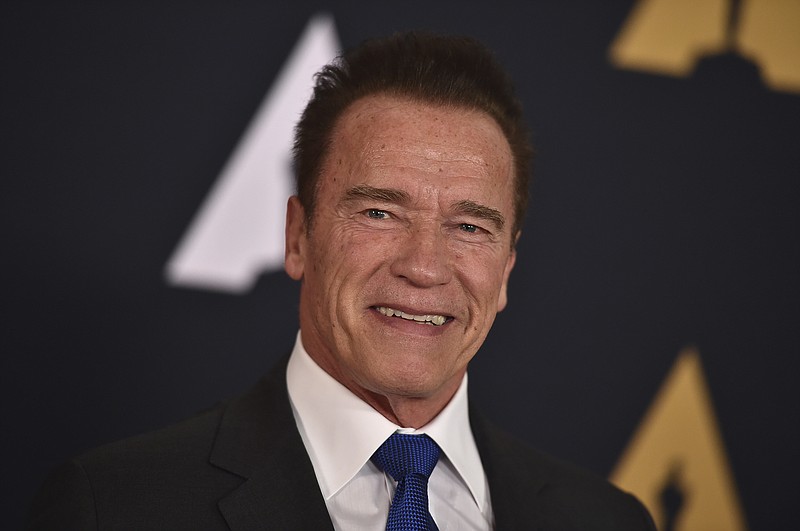 
              FILE - In this Nov. 12, 2016 file photo, Arnold Schwarzenegger arrives at the 2016 Governors Awards in Los Angeles. Schwarzenegger, star of the new version of "The New Celebrity Apprentice," is unfazed that President-elect Donald Trump has retained a producer's stake in the show. Schwarzenegger said Friday, Dec. 9, 2016, that it's just business, comparable to his situation when he became California's governor and retained a screen credit and kept earning royalties for the "Terminator" movie. (Photo by Jordan Strauss/Invision/AP, File)
            