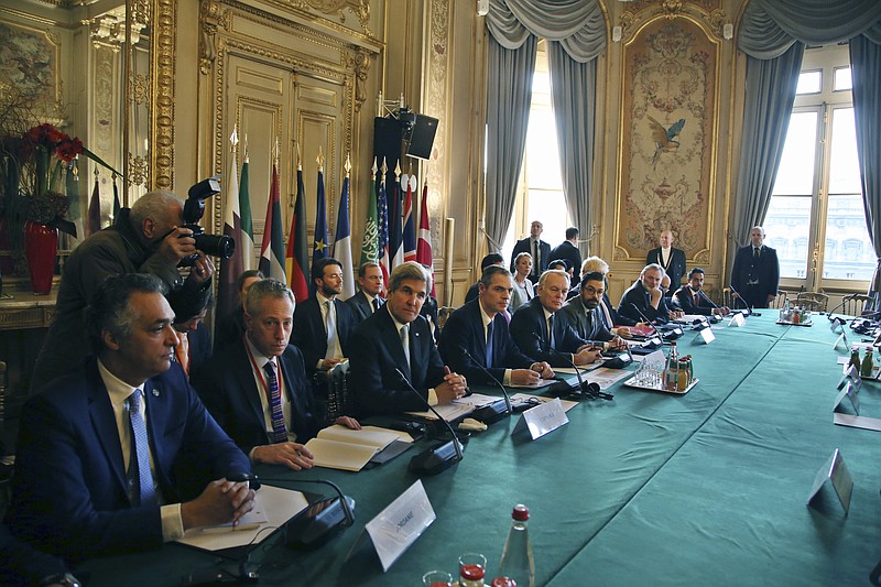 
              U.S. Secretary of State John Kerry, third left, and France's Foreign Minister Jean Marc Ayrault, fifth left, attend a meeting with others on Syria in Paris, Saturday, Dec. 10, 2016. Kerry, Ayrault and leading diplomats are trying to find solutions for Syria's desperate opposition, as Syrian government forces squeeze rebels out of Aleppo after a devastating blitz. (AP Photo/Thibault Camus, Pool)
            