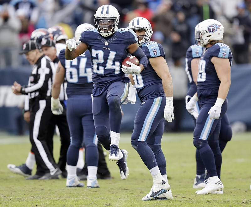 
              Tennessee Titans safety Daimion Stafford (24) celebrates after recovering a fumble by Denver Broncos tight end A.J. Derby to stop the Broncos' final drive in the fourth quarter of an NFL football game Sunday, Dec. 11, 2016, in Nashville, Tenn. The Titans won 13-10.(AP Photo/James Kenney)
            