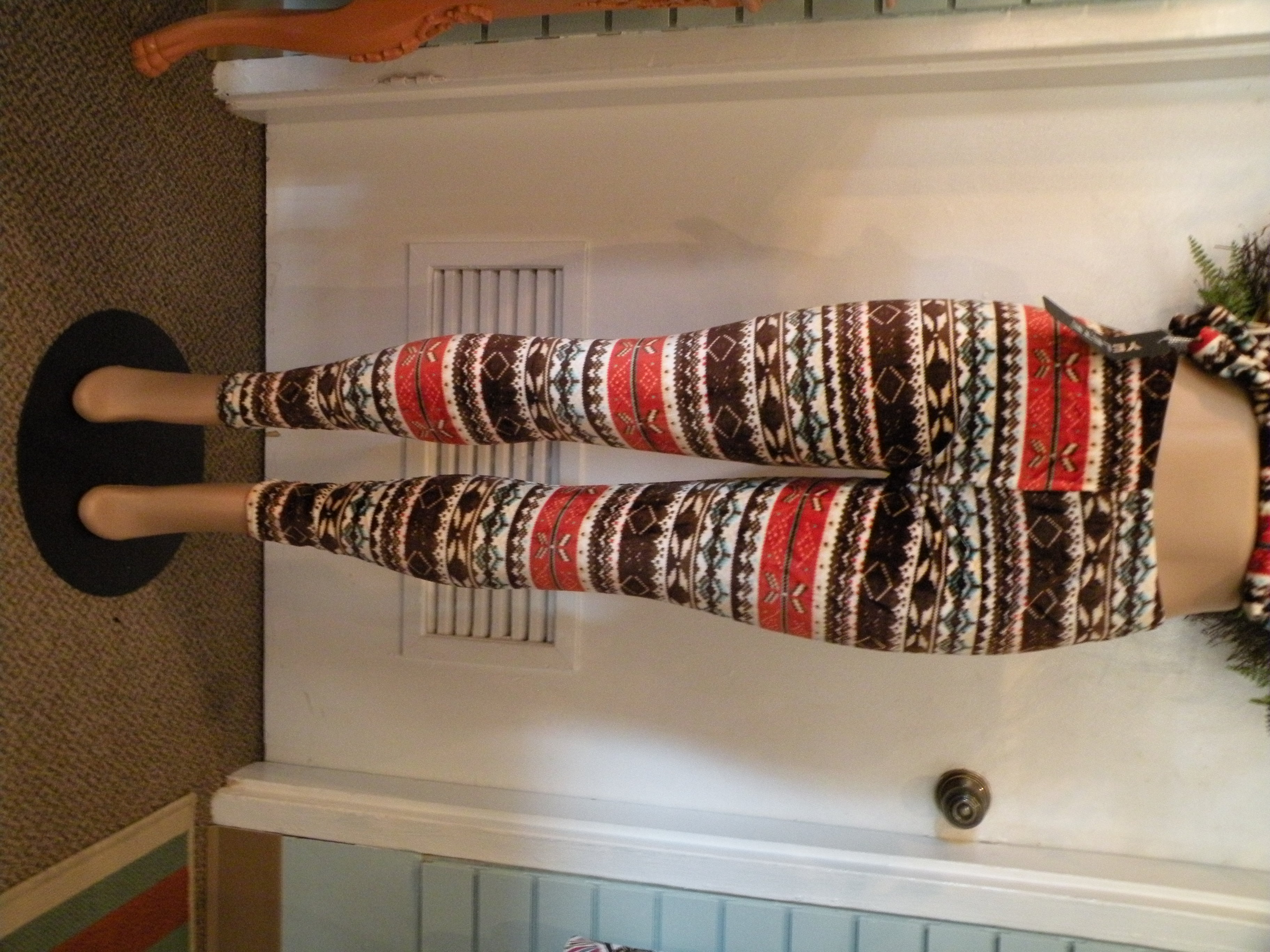 Yessick's on Signal's velvet printed leggings are perfect for the holidays, either for sitting by the fire or setting under the tree.