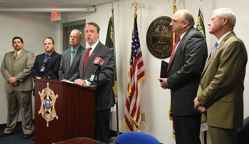 District Attorney General Steve Crump, at podium, speaks Tuesday, Dec. 13, 2016 after Donnie Brantley was arraigned in the Bradley County Criminal Court. Also present are Lt. David Shoemaker, Det. Zech Pike, Capt. Steve Pike, Sheriff Eric Watson and Calvin Rockholt, from left.