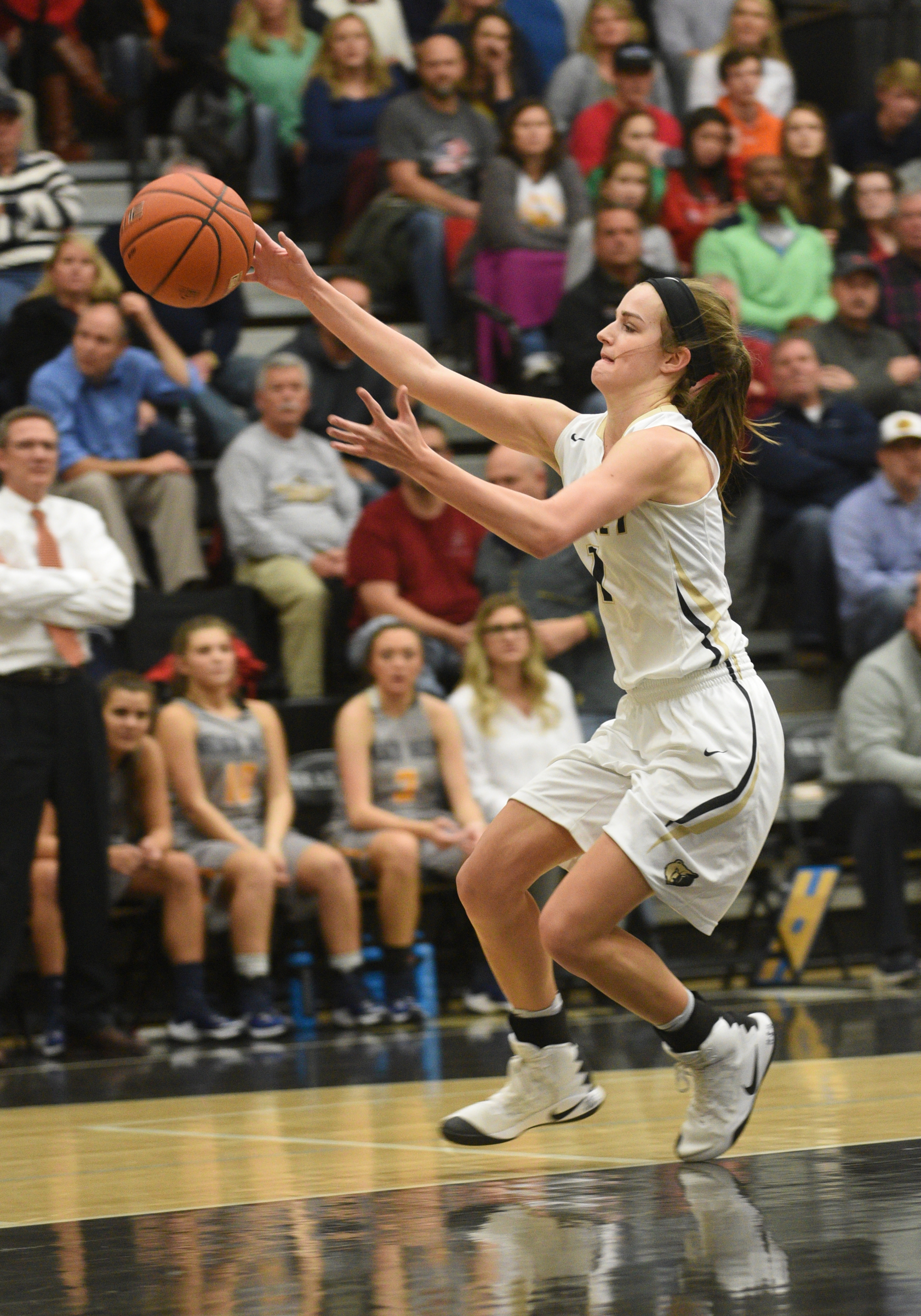 Bradley Central's Halle Hughes reaches for the ball in the game against Walker Valley Tuesday, Dec. 13, 2016, at Bradley Central High School.