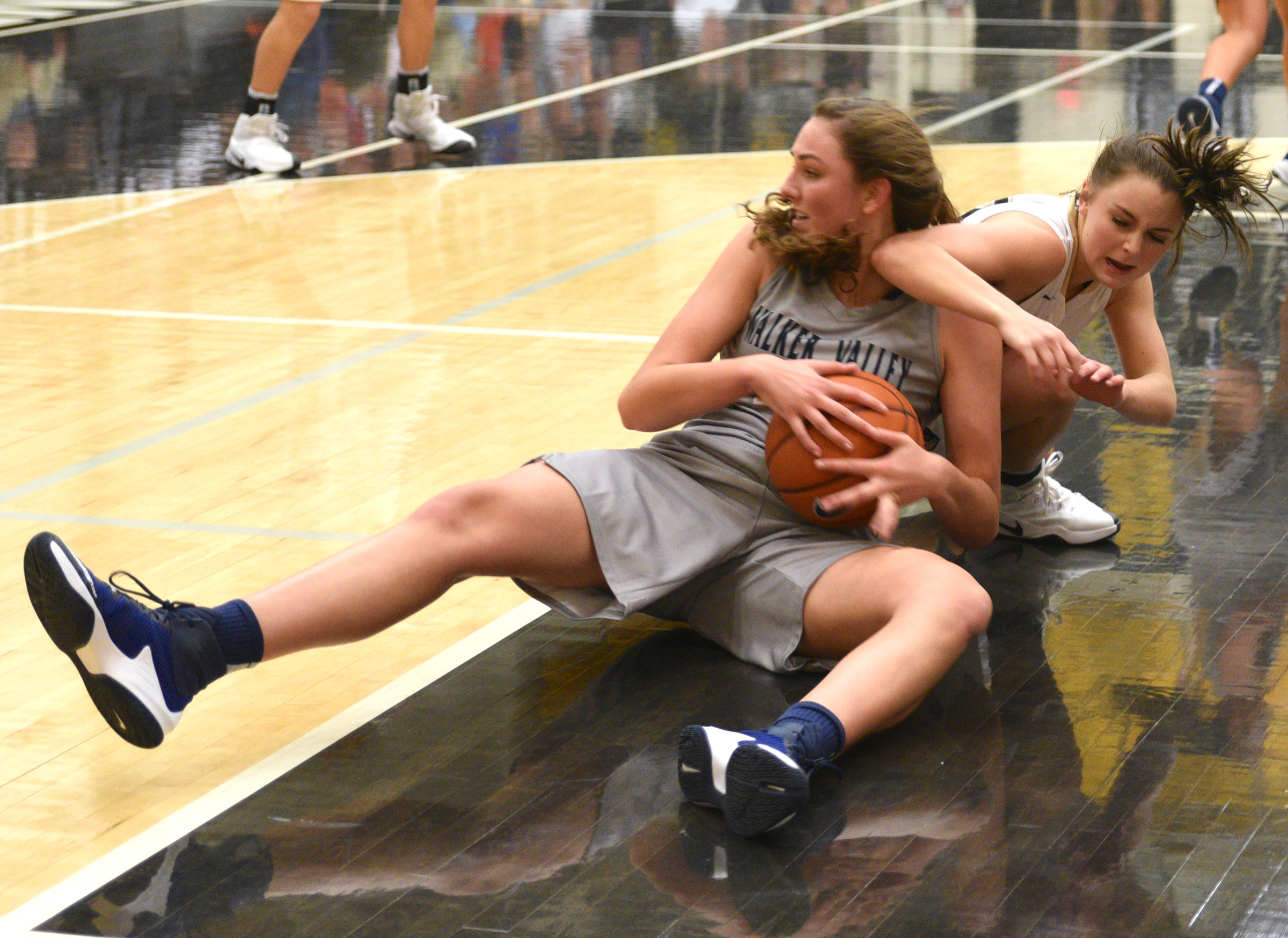 Bradley Central's Sydney Morgan and Walker Valley's Haley Jones battle for the ball Tuesday, Dec. 13, 2016, at Bradley Central High School.