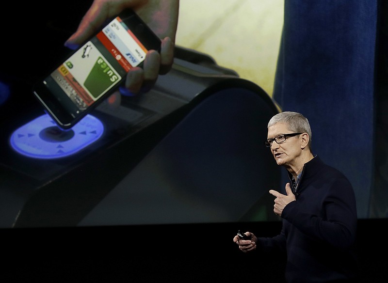 
              FILE - In this Thursday, Oct. 27, 2016, file photo, Apple CEO Tim Cook speaks during an announcement of new products, in Cupertino, Calif. Technology leaders are about to come face-to-face with President-elect Donald Trump after fiercely opposing his candidacy, fearful that he would stifle innovation, curb the hiring of computer-savvy immigrants and infringe on consumers’ digital privacy. On Wednesday, Dec. 14, 2016, Silicon Valley luminaries and other technology leaders are headed to Trump Tower in New York to make their peace, or press their case, with Trump and his advisers. Cook is one of the CEOs expected to attend. (AP Photo/Marcio Jose Sanchez, File)
            