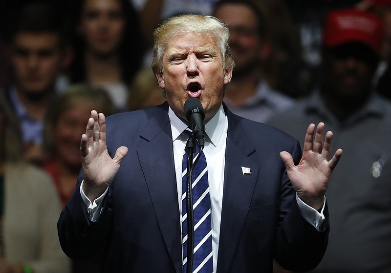 
              In this Dec. 9, 2016, photo, President-elect Donald Trump speaks to supporters during a rally, in Grand Rapids, Mich. In claiming that he scored “a massive landslide victory” in last month’s presidential election, Trump turned history upside down. In fact, his winning margin in the Electoral College is on the other end of the historical spectrum, far closer to the narrowest win in history than to the widest. (AP Photo/Paul Sancya)
            