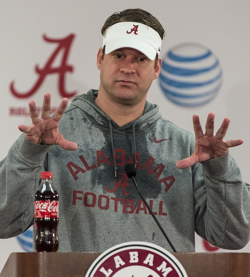 
              FILe - In this Jan. 6, 2016, file photo, Alabama offensive coordinator Lane Kiffin talks with the media in Tuscaloosa, Ala. A person with direct knowledge of the situation tells The Associated Press that Alabama offensive coordinator Lane Kiffin has agreed in principle to become the next coach at Florida Atlantic. The person, who spoke to the AP on condition of anonymity because neither side had revealed anything publicly, said the school was preparing an announcement likely to come later Monday. (Vasha Hunt/AL.com via AP, File)
            