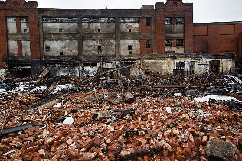 The Standard Coosa Thatcher mill, which was damaged by a 2-alarm fire in July, is seen Tuesday, Dec. 6, 2016, in Chattanooga, Tenn. The city will consider an 18-year tax break for the $57.5 million redevelopment of the property into a loft apartment complex.