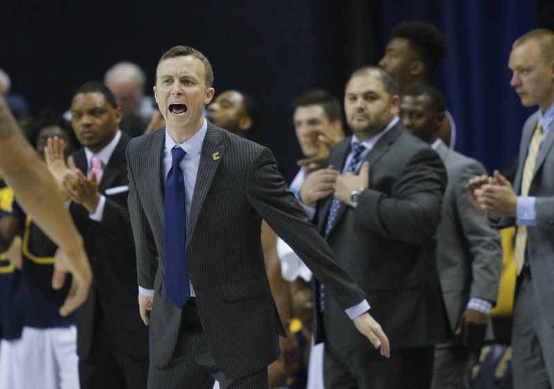 UTC men's basketball coach Matt McCall shouts to players during the Mocs' home basketball game against Tennessee Wesleyan at McKenzie Arena on Wednesday, Dec. 14, 2016, in Chattanooga, Tenn.