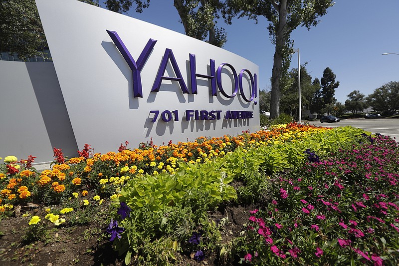 This Tuesday, July 19, 2016 photo shows a Yahoo sign at the company's headquarters in Sunnyvale, Calif. On Wednesday, Dec. 14, 2016, Yahoo said it believes hackers stole data from more than one billion user accounts in August 2013. (AP Photo/Marcio Jose Sanchez)