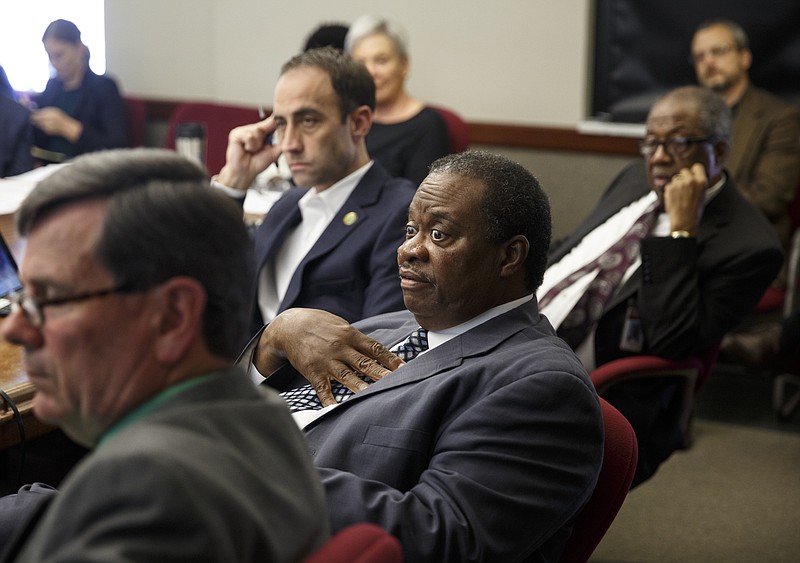 Chattanooga City Councilman Yusuf Hakeem, second from left, asks a question during a presentation on the city's wastewater infrastructure earlier this year.