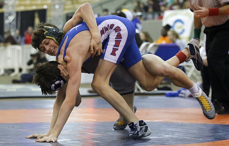 Notre Dame's Tucker Gill, top, wrestles Red Bank's Blake Reichel in their 106-pound state tournament bout in February 2015 in Franklin, Tenn. Gill won the weight class. Notre Dame and Red Bank will be part of the McCallie Invitational tonight and Saturday.