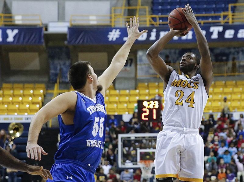 UTC guard Casey Jones shoots a 3 over Tennessee Wesleyan center Will Gardner during the Mocs' home win Wednesday afternoon. Jones, a two-time All-Southern Conference player, is adapting to a new role in his restored final year of eligibility.