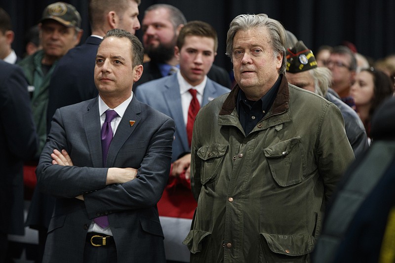 
              President-elect Donald Trump's chief of staff Reince Priebus, left, stands with his chief strategist Steven Bannon during a rally at the Wisconsin State Fair Exposition Center, Tuesday, Dec. 13, 2016, in West Allis, Wis. (AP Photo/Evan Vucci)
            