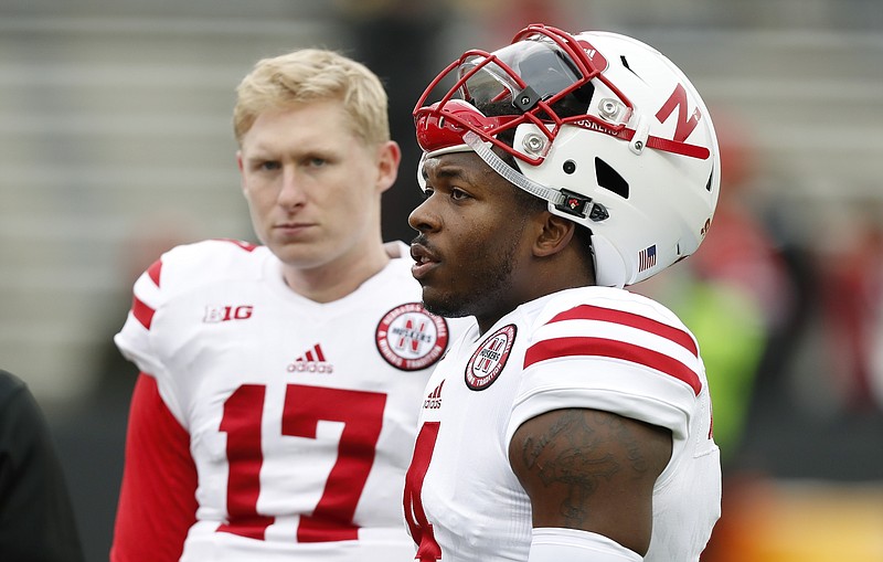 Nebraska quarterbacks Tommy Armstrong (4) and Ryker Fyfe (17) have been battling hamstring and wrist injuries leading into their Dec. 30 showdown against Tennessee in the Music City Bowl.