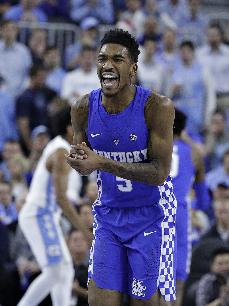 
              Kentucky's Malik Monk celebrates after scoring against North Carolina during the first half of an NCAA college basketball game Saturday, Dec. 17, 2016, in Las Vegas. (AP Photo/John Locher)
            