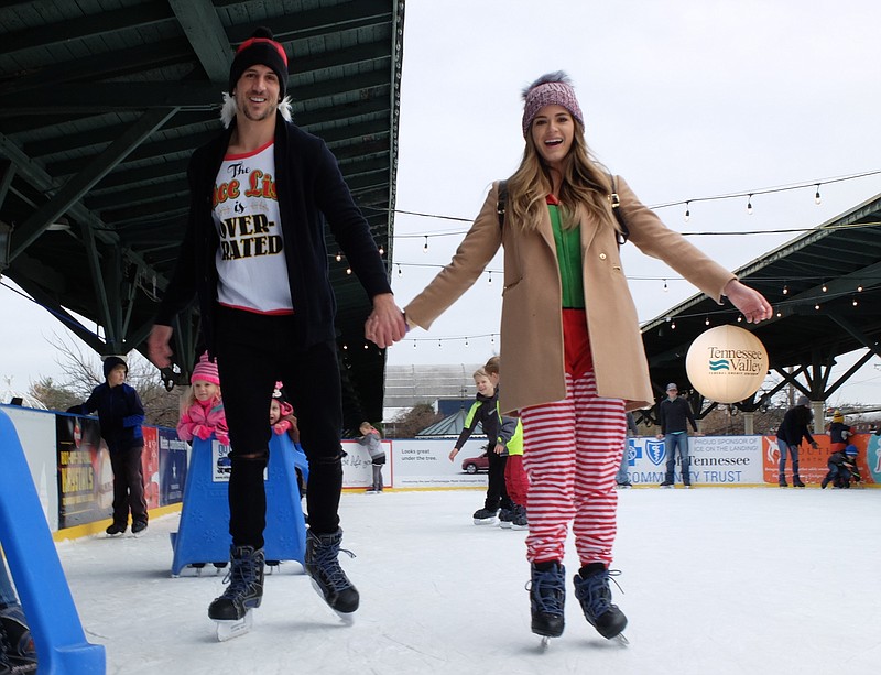 ABC's most recent television Bachelorette, JoJo Fletcher, skates with her man Jordan Rodgers Monday afternoon on the rink at Ice on the Landing in the garden at the Chattanooga Choo Choo.