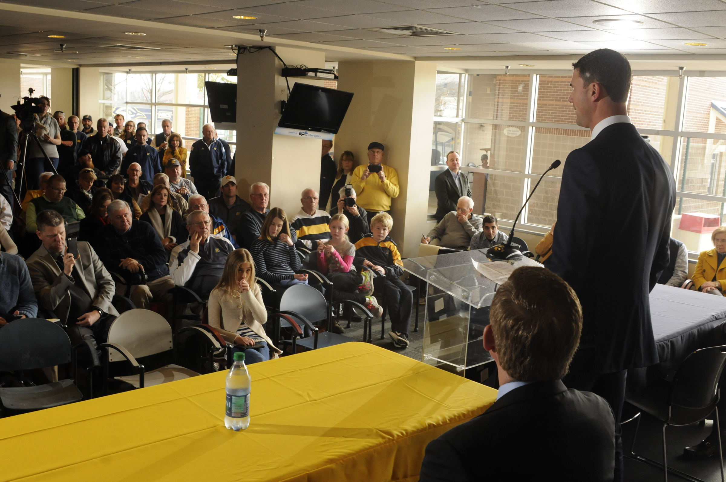 Tom Arth speaks to fans, the media and attending players as the new Chattanooga Mocs head football coach Tuesday inside the Stadium Club at Finley Stadium.