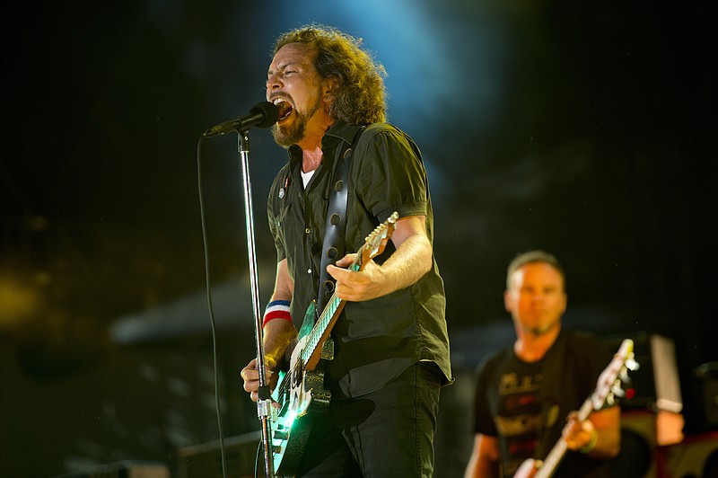 In this Sept. 2, 2012, file photo, Pearl Jam performs at the "Made In America" music festival in Philadelphia. The Seattle-based rockers and the late rapper Tupac Shakur lead a class of Rock and Roll Hall of Fame inductees that also include folkie Joan Baez and 1970s favorites Journey, Yes and Electric Light Orchestra. The hall's 32nd annual induction ceremony will take place on April 7, 2016, at Barclays Center in Brooklyn, N.Y. (Photo by Drew Gurian/Invision/AP, File)
