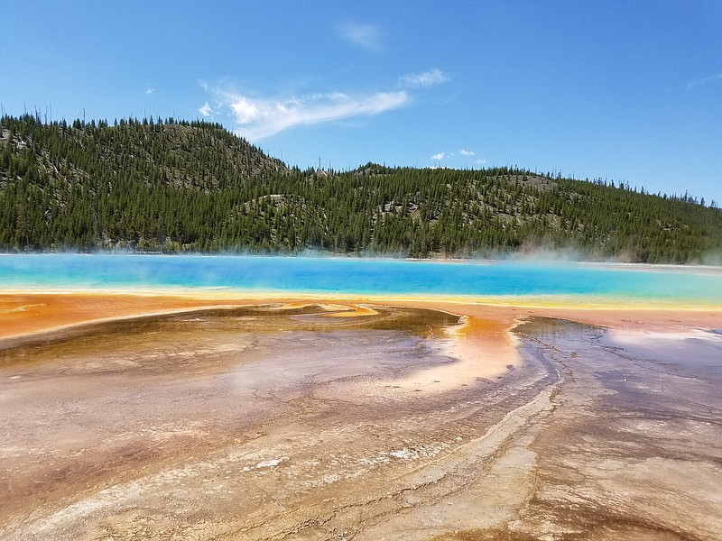 At Grand Prismatic Spring, the steam rising from the hot springs matches the colorful water below. (Photo by Jamie Smith)