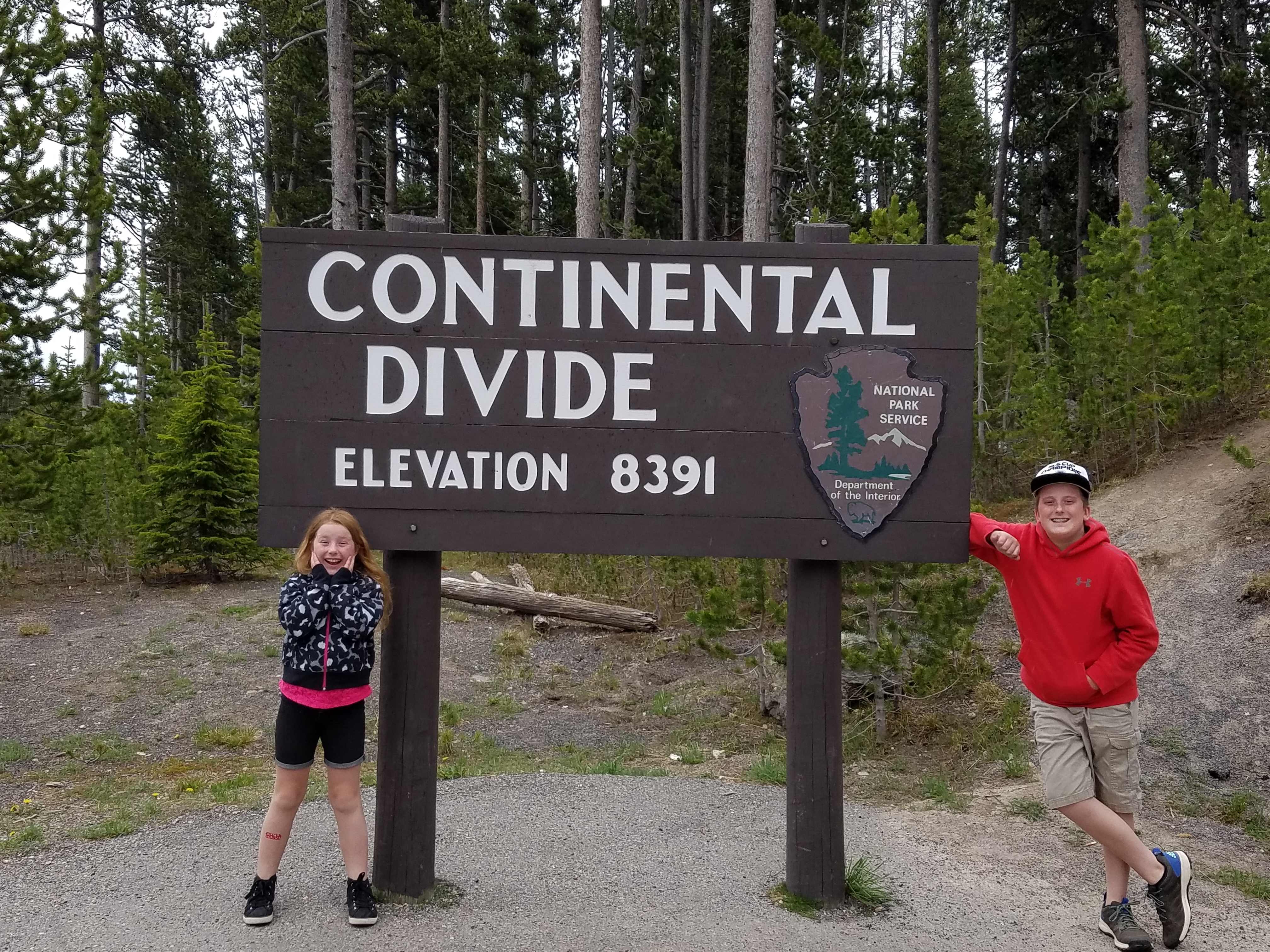 The author's children at the Continental Divide. The main highways through Yellowstone cross the Continental Divide at three different points. (Photo by Jamie Smith)