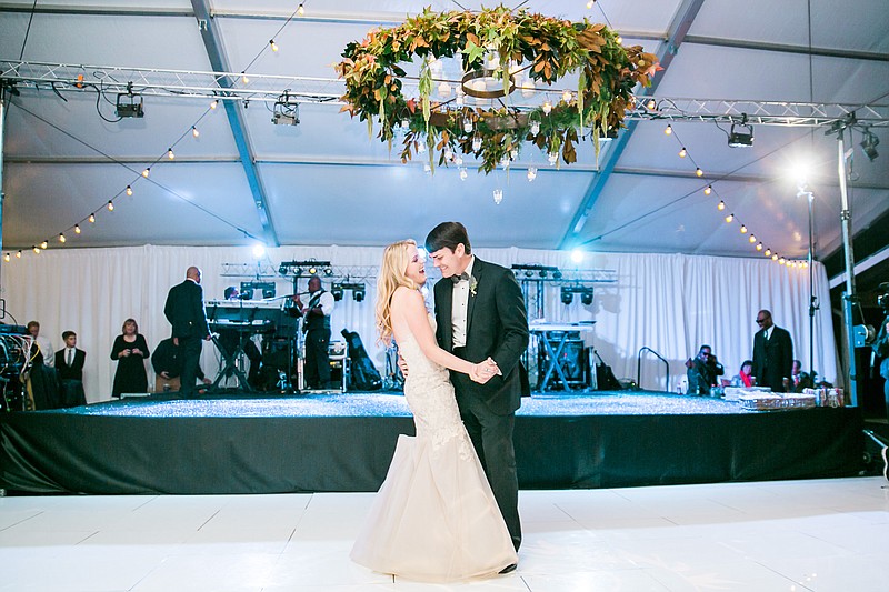 Rachel and Brent Allred share their first dance during their wedding planned by Victoria Love Events. (Photo by Bamber Photography)