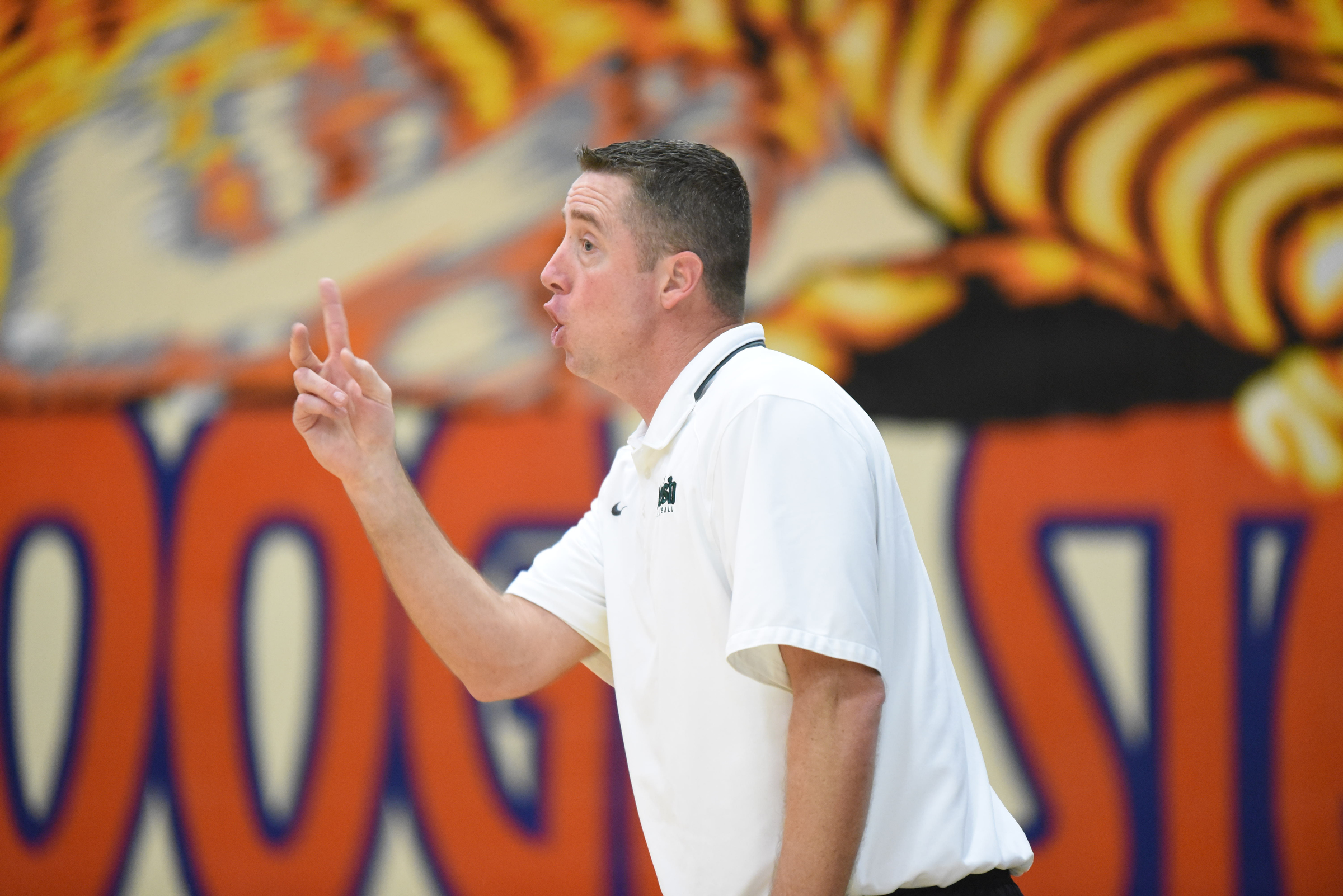 Notre Dame coach Jason Hill calls a play to his girls during the Tyner game Wednesday in the Best of Preps basketball tournament at Chattanooga State.