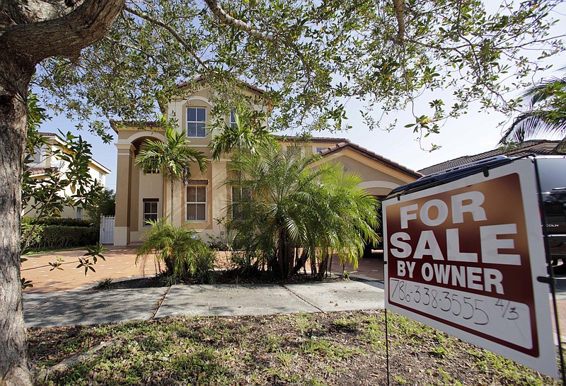 
              This Wednesday, Dec. 7, 2016, photo shows a house for sale, in Hialeah, Fla. Americans bought homes in November at the fastest pace in nearly a decade, despite a shortage of houses for sale, according to information released Wednesday, Dec. 21, 2016, by the National Association of Realtors. (AP Photo/Alan Diaz)
            