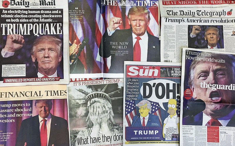 
              FILE - This Thursday, Nov. 10, 2016 file photo shows the front pages of various British newspapers in London reporting on Donald Trump winning the U.S. presidential election. Widely viewed as a long shot, with an unconventional campaign featuring raucous rallies and pugnacious tweets, he outlasted 16 Republican rivals. Among the Democrats, Hillary Clinton beat back an unexpectedly strong challenge from Bernie Sanders, and won the popular vote over Trump. But he won key Rust Belt states to get the most electoral votes, and will enter the White House with Republicans maintaining control of both houses of Congress. (AP Photo/Tony Hicks)
            