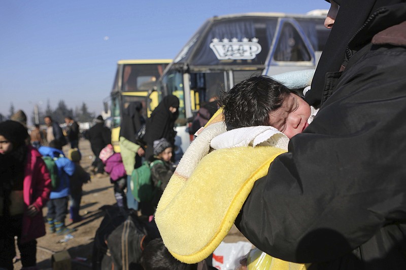 Syrians evacuated from the embattled Syrian city of Aleppo during the ceasefire arrive at a refugee camp in Rashidin, near Idlib, Syria, last week.