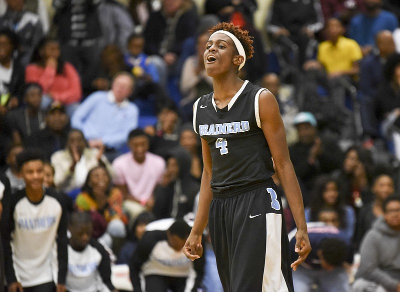 Brainerd's Vesta Melvin Jr. yells his approval during the final seconds of the the boys' semifinal game against Tyner Thursday night at Chattanooga State.