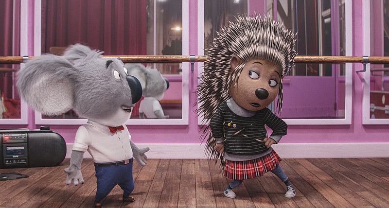 This image released by Universal Pictures shows Buster Moon, voiced by Matthew McConaughey, left, and Ash, voiced by Scarlett Johansson, in a scene from "Sing." (Illumination Entertainment/Universal Pictures via AP)