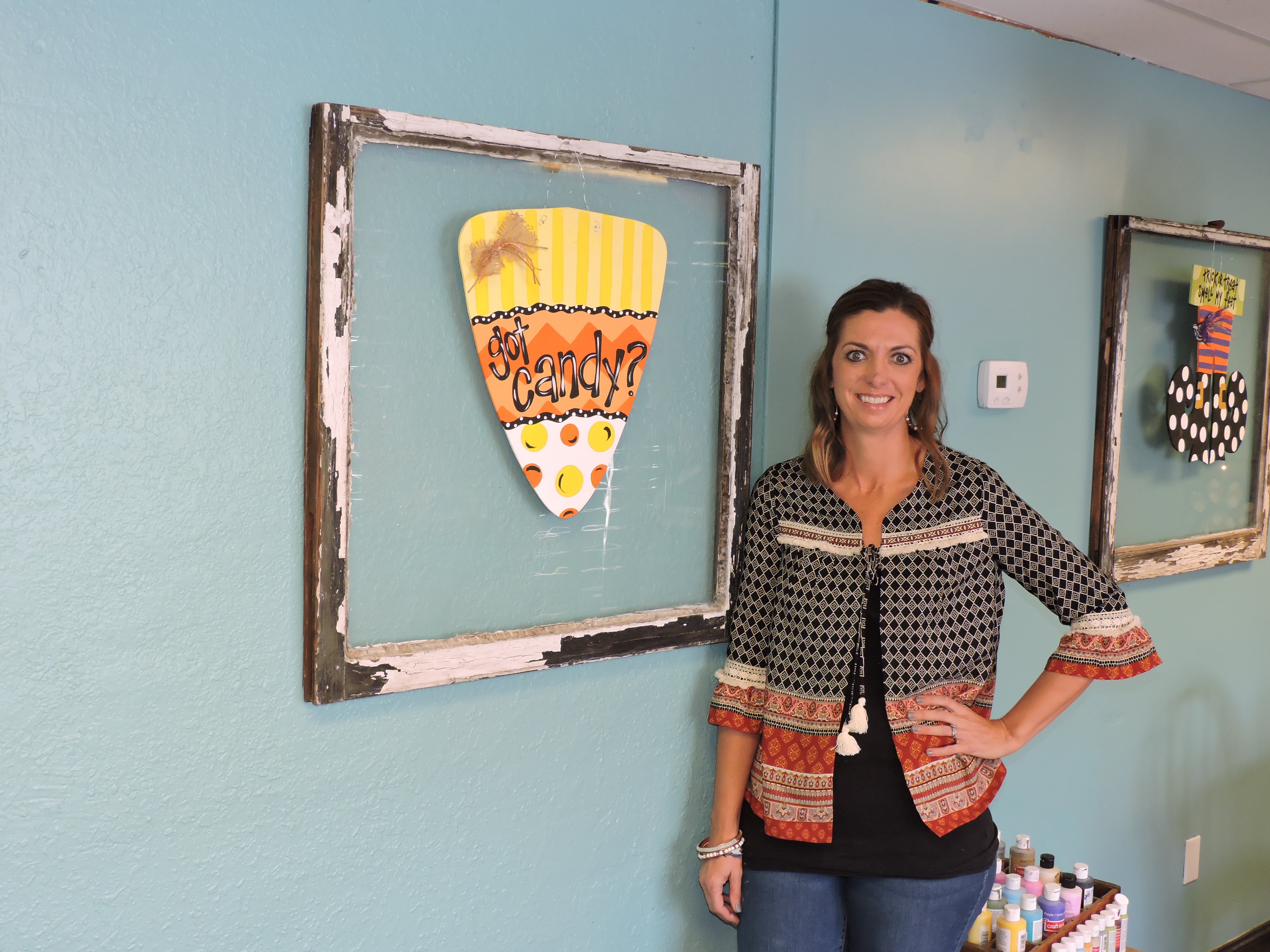 Alydots owner Alyson Tunnell hangs out in her new store in downtown Ringgold.