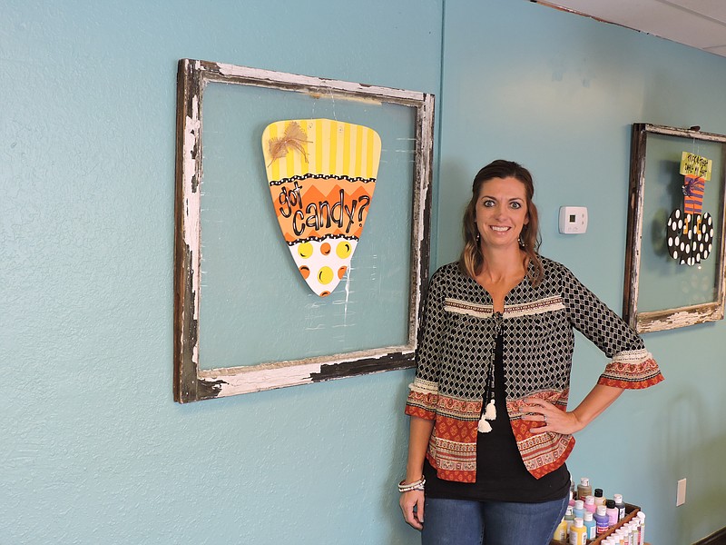 Alydots owner Alyson Tunnell hangs out in her new store in downtown Ringgold.
