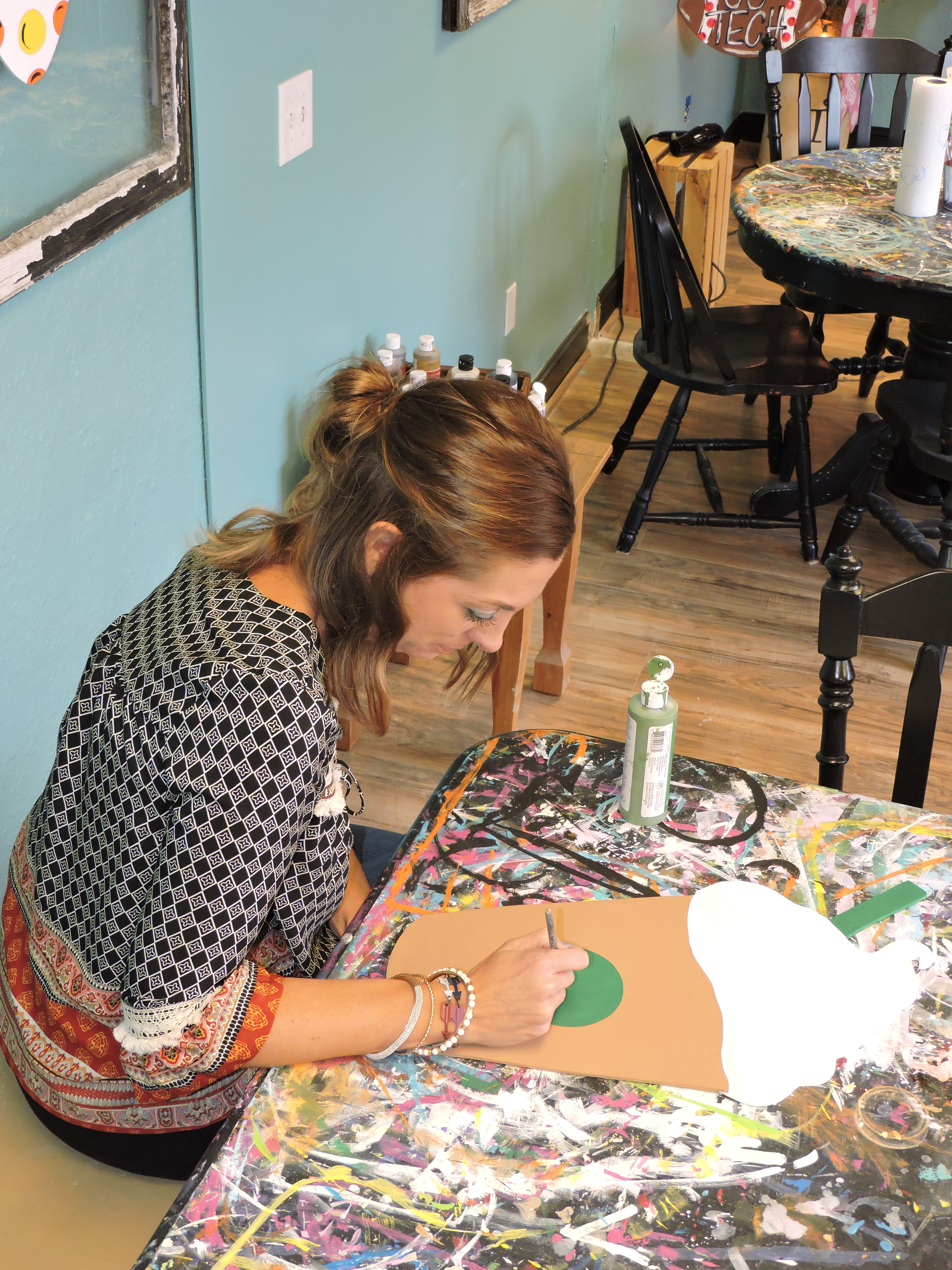 Alydots owner Alyson Tunnell creates a Starbucks inspired door hanger.