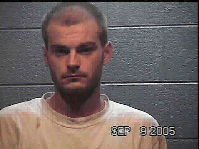 Jonathan Carringer, 33, was charged with the murder of his wife, Annie, after reporting her death Wednesday night.