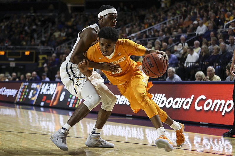 Tennessee's Detrick Mostella drives to the basket in the first half of the Vols' game at East Tennessee State in Johnson City on Dec. 22. (Photo By Craig Bisacre/Tennessee Athletics)