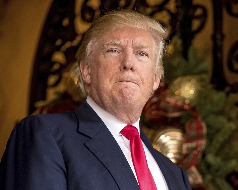 President-elect Donald Trump takes a question from a member of the media at Mar-a-Lago, in Palm Beach, Fla., Wednesday, Dec. 21, 2016. Trump on Thursday abruptly called for the United States to "greatly strengthen and expand its nuclear capability" until the rest of the world "comes to its senses" regarding nuclear weapons. Trump made the statement on Twitter and did not expand on either the actions he wants the U.S. to take or the issues he sees around the world. (AP Photo/Andrew Harnik)