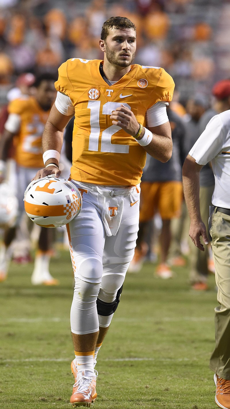 Tennessee quarterback Quinten Dormady (12) jogs off the field.  The top-ranked University of Alabama Crimson Tide visited the University of Tennessee Volunteers in SEC football action on October 15, 2016