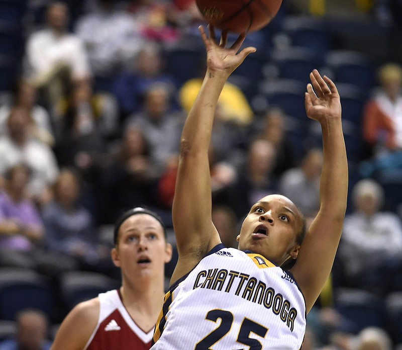 UTC's Chelsey Shumpert (25) fires a off-balanced shot.  The Indiana Hoosiers visited the UTC Mocs in NCAA basketball action at McKenzie Arena on November 17, 2016.    