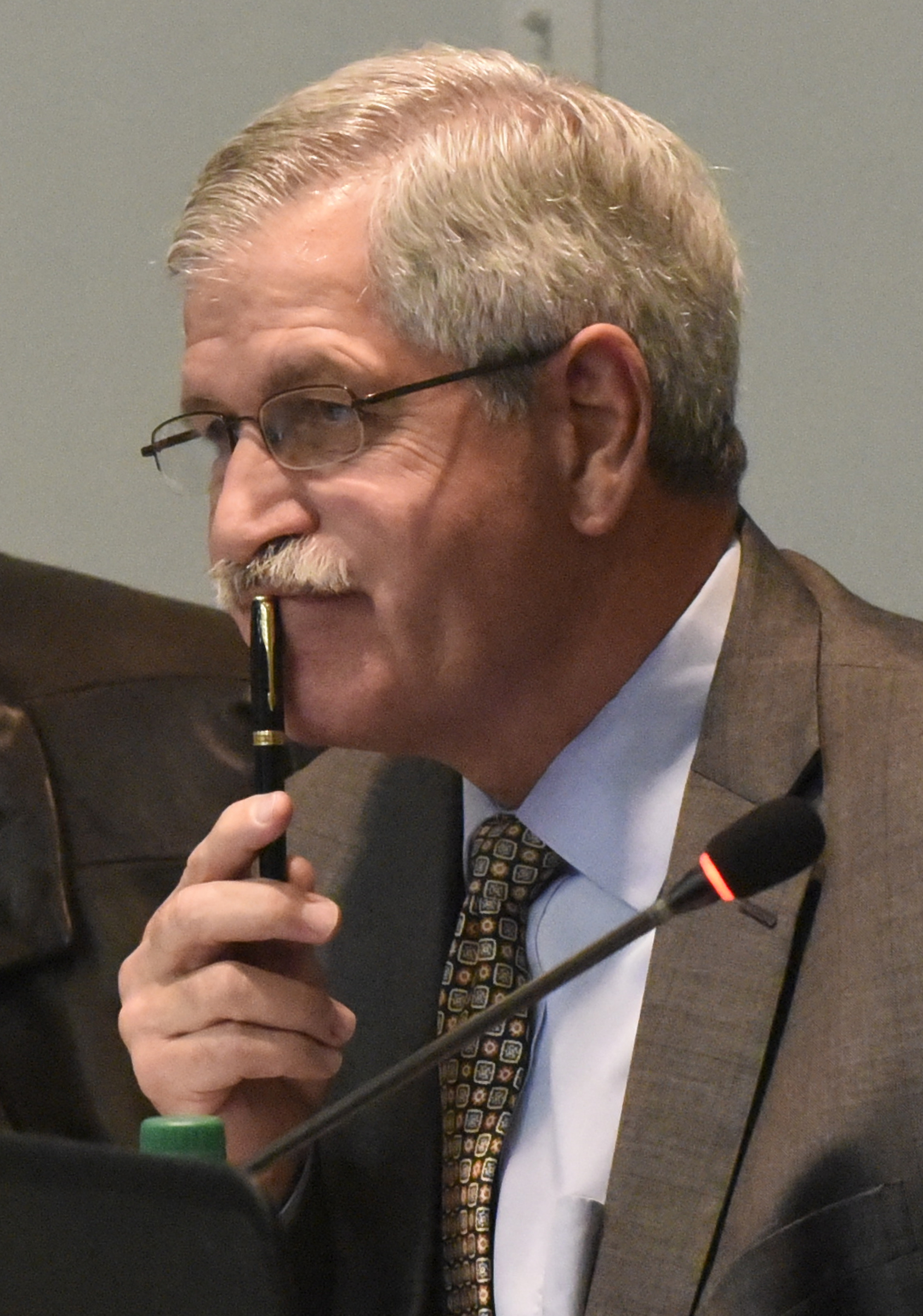 School Superintendent Rick Smith listens during a meeting of the Hamilon County School Board on Thursday, Jan. 21, 2016, in Chattanooga, Tenn.