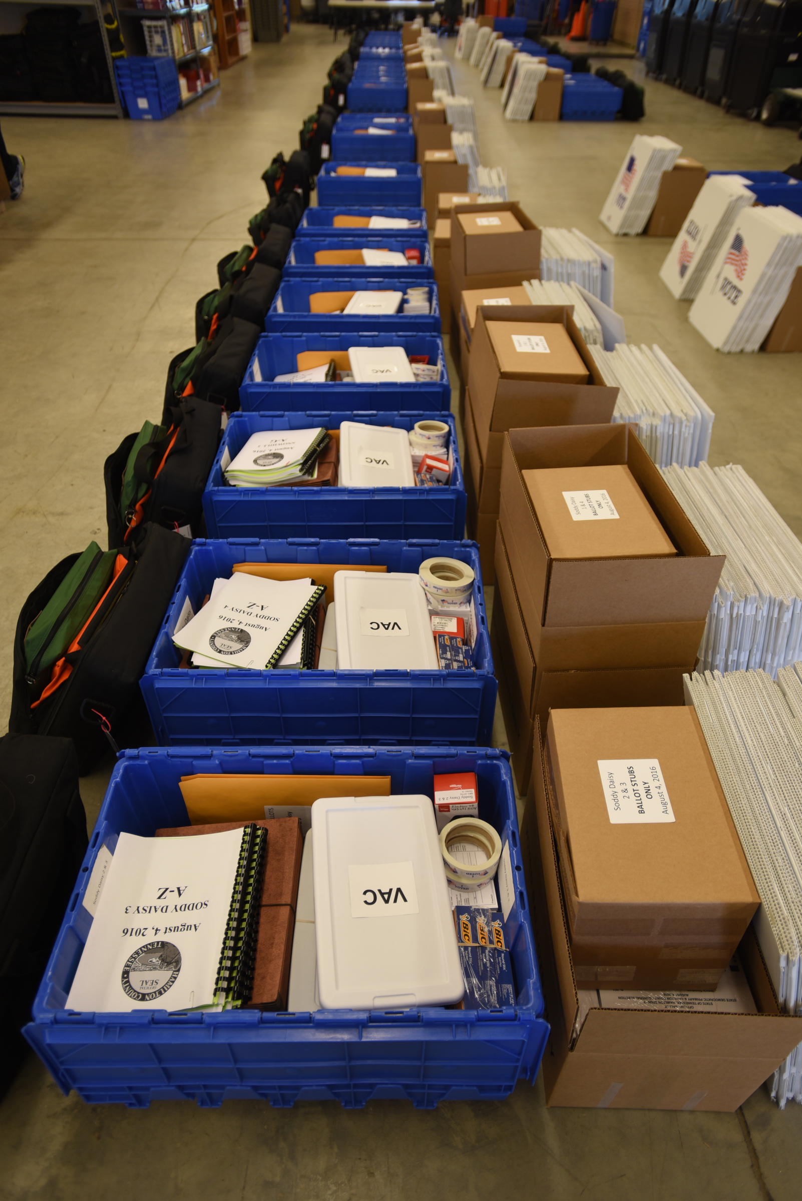 Poll items line the floor Wednesday, August 3, 2016 at the Election Commission on Amnicola Highway.