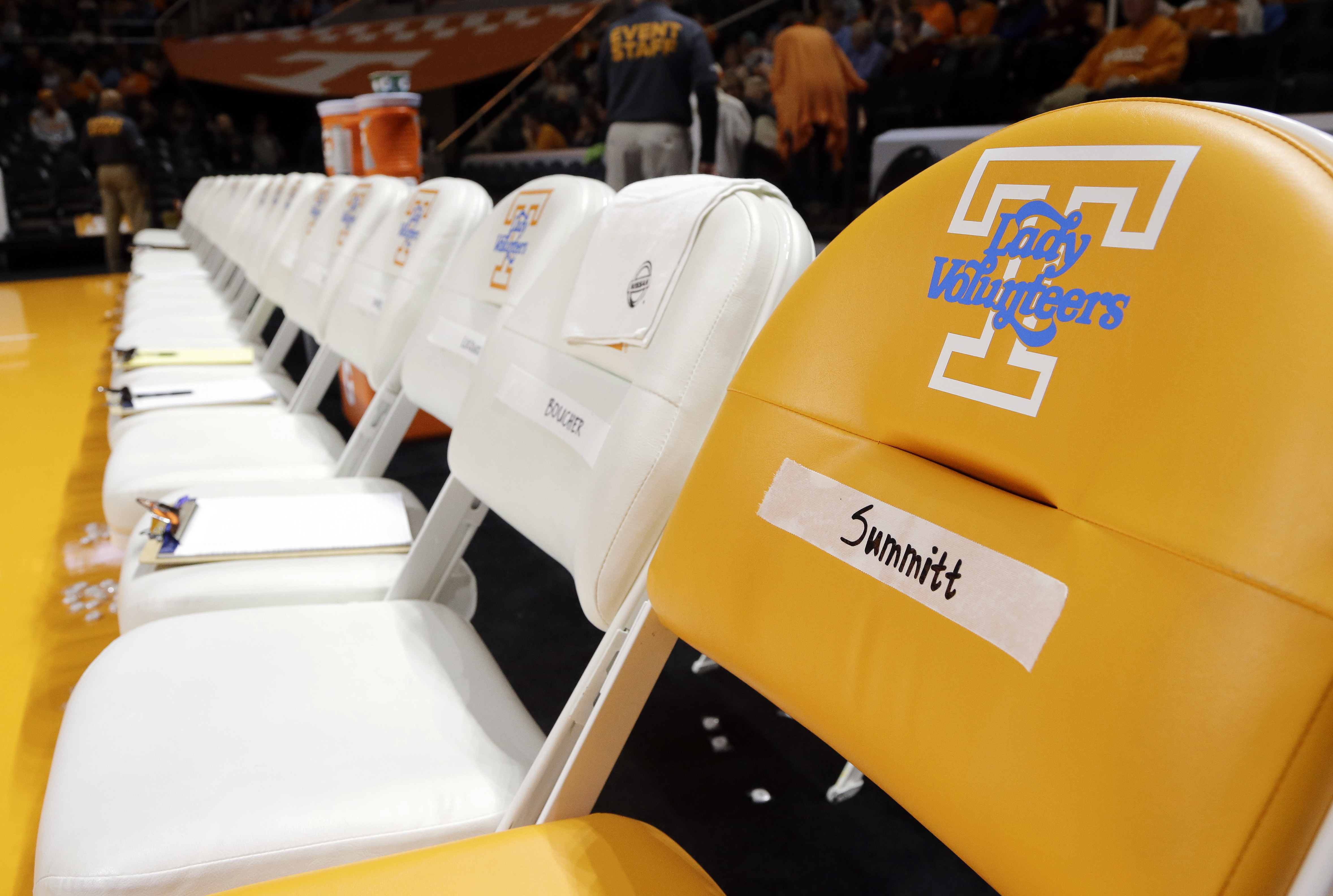 A chair labeled for Pat Summitt sits at the end of the Tennessee women's basketball team bench before a game between Tennessee and Baylor Sunday, Dec. 4, 2016, in Knoxville, Tenn. Summitt was the head basketball coach at Tennessee from 1974-2012. She died June 28, 2016. (AP Photo/Mark Humphrey)