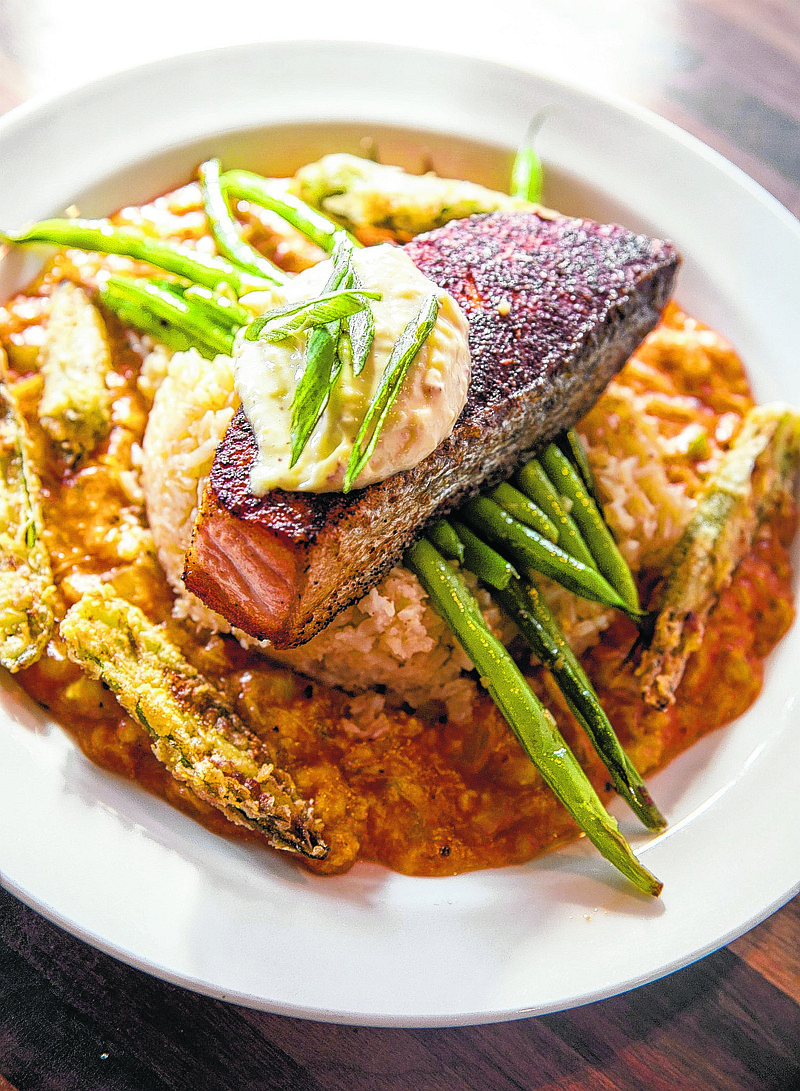 Blackened salmon with crab gumbo and pickled green tomato aioli