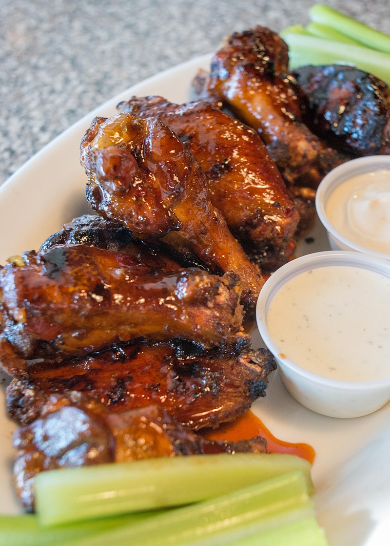 Blackberry-bourbon-Sriracha wings at Diamond Billiard Club. (Photo by Mark Gilliland)