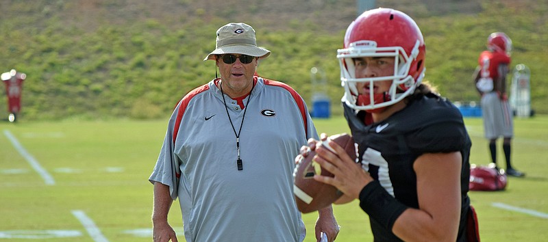 Georgia first-year offensive coordinator Jim Chaney has been challenged this season to produce a downhill rushing attack with a quarterback, freshman Jacob Eason, who is more comfortable in the shotgun.