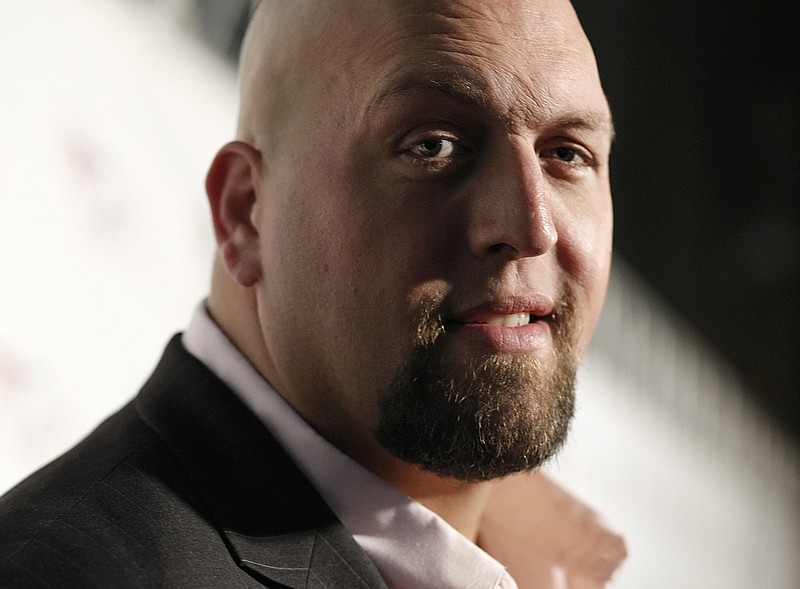 
              FILE - In this Friday, Aug. 21, 2009, file photo, WWE Wrestler Big Show arrives at the World Wrestling Entertainment SummerSlam kickoff party benefiting Betty's Battle in Los Angeles. A story reported by a blog called "WWE" that claimed professional wrestling star "Big Show" had died in a car accident is false. Chris Bellitti, a spokesman for World Wrestling Entertainment, Inc., said Tuesday, Dec. 27, 2016, that the "Big Show," whose real name is Paul Donald Wight II, is alive and well. (AP Photo/Dan Steinberg, File)
            